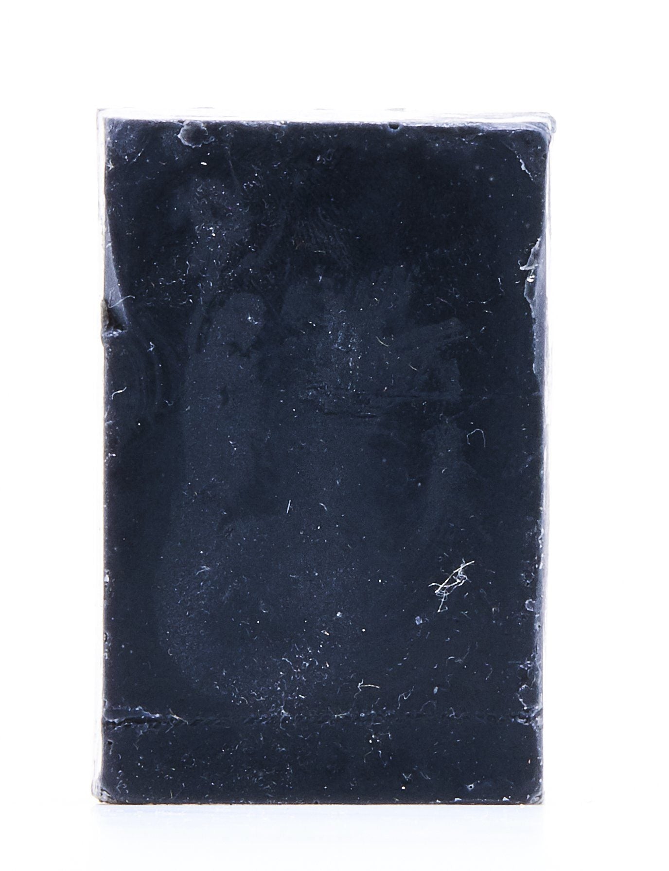 Handcrafted Charcoal Tea Tree Soap with a smooth, dark texture, designed for deep cleansing and skincare