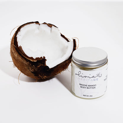 Maddie Mango Body Butter, a rich, hydrating body care product that nourishes and softens the skin with a tropical mango scent, available at OliviasHeritage.com