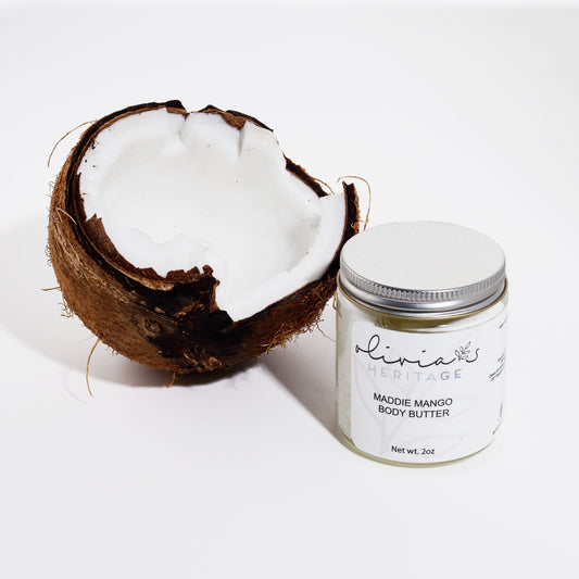 Maddie Mango Body Butter, a rich, hydrating body care product that nourishes and softens the skin with a tropical mango scent, available at OliviasHeritage.com