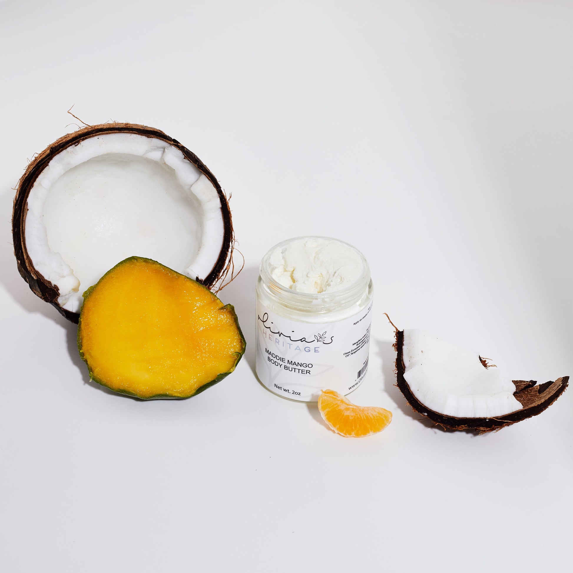 Maddie Mango Body Butter, a rich, hydrating body care product that nourishes and softens the skin with a tropical mango scent, available at OliviasHeritage.com