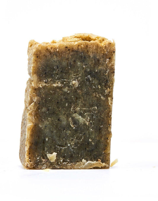 Tea Tree Lavender Soap bar with a smooth texture and calming lavender hue.